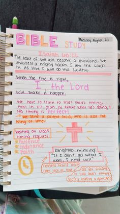 a bible study book with writing on the pages and colored crayons in it