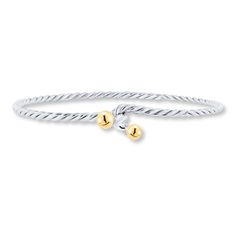 This stylish bangle bracelet for her is crafted of sterling silver designed to look like a rope. Spheres of 14K yellow gold adorn each end of the hook and eye clasp. Bracelet Sphere, Modern Silver Jewelry, Bracelet For Her, Gold Stock, Jewelry Advice, Gold And Silver Bracelets, Jewelry Accessories Ideas, Bracelet Sterling Silver, Sea Glass Jewelry