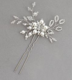 a bridal hair comb with pearls and leaves