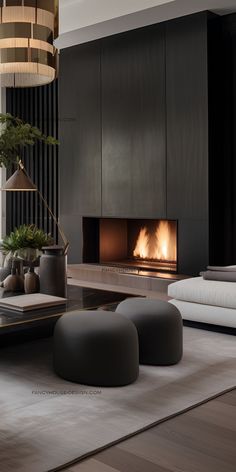 a modern living room with a fireplace and couches