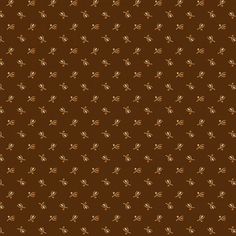 a brown background with small leaves on it