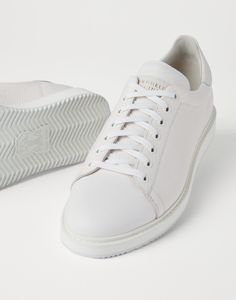 Grained calfskin sneakers These sneakers combine a classic slim and essential design with fine materials and skillful craftsmanship. The refined texture of grained calfskin, featuring an uneven effect, enhances the vintage feel of the shoe. Comfort is guaranteed by a lightweight rubber sole. Luxury Calf Leather Sneakers With Stitched Sole, Luxury Sneakers With Leather Sole And Plain Toe, Elegant Low-top Calf Leather Sneakers, Elegant Low-top Sneakers With Stitched Sole, Fashionable Sneakers With Contrast Sole And Calf Leather, Elegant Sneakers With Contrast Sole And Calf Leather, Elegant Low-top Custom Sneakers In Calf Leather, Elegant Calf Leather Sneakers With Textured Sole, Elegant Sneakers With Plain Toe And White Sole