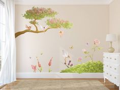 a room with flowers and butterflies painted on the wall next to a dresser in front of a window