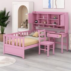 a child's bedroom with pink furniture and accessories