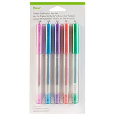 four different colored pens in packaging