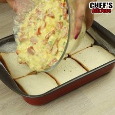 someone is adding cheese to bread in a pan