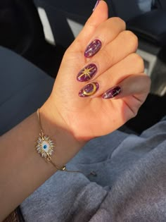 Pretty Nail Ideas Purple Nails Witchy, Purple Moon And Star Nails, Almond Nails Stars And Moon, Purple Boho Nails, Biab Nails Purple, Purple Halloween Nails Almond, Cute Painted Nail Ideas, 90s Whimsigoth Nails, Moon Nails Purple