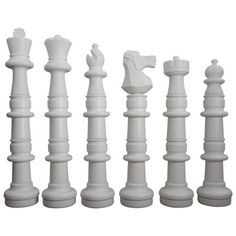 white chess pieces lined up in a row