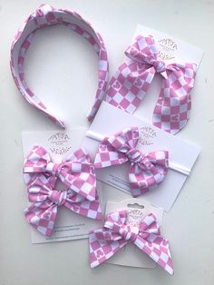 Super cute mouse accessories with a pink and white checkered pattern. Comes in a nylon headband, or bow on an alligator clip, or tie knot headband! Any of these would be perfect for a trip to the happiest place on earth! Playful Bow Headband Hair Accessory, Cute Pink Summer Bow, Playful Adjustable Bow For Summer, Adjustable Playful Bow For Summer, Fun Pink Hair Accessories For Spring, Playful Bow Hair Accessories For Gift, Playful Bow Headband For Gift, Playful Adjustable Bow With Matching Headband, Adjustable Playful Bow With Matching Headband