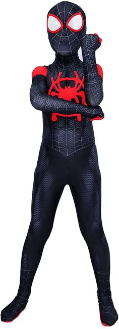 a man in a spiderman costume standing with his arms crossed