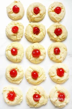 the cookies have cherries on them and are ready to be baked in the oven