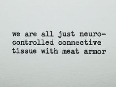 an old typewriter with the words we are all just neuro controlled connective tissue with meat armor