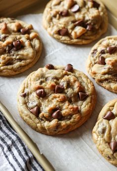 chocolate chip cookies are on a baking sheet