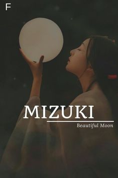 a woman holding a white frisbee in her hand with the words mizuki above it