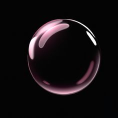 a close up of a soap bubble on a black background