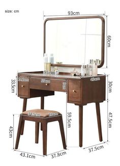 an image of a vanity with stool and mirror on the table in front of it