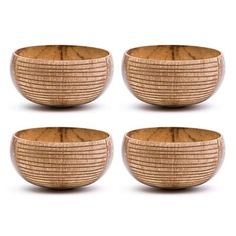 four wooden bowls sitting next to each other