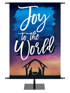 a sign that says, joy to the world with a nativity scene on it