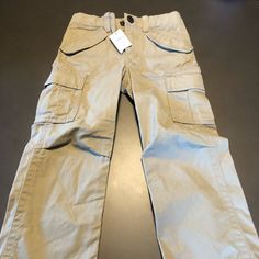 Gap Cargo Khaki Pants. Size 4. Gap Cotton Cargo Bottoms, Gap Cotton Cargo Pants With Pockets, Gap Cotton Cargo Pants, Cotton Cargo Pants By Gap, Gap Cotton Pants With Side Pockets, Gap Cotton Bottoms With Side Pockets, Gap Cotton Cargo Style Bottoms, Gap Straight Leg Pants With Side Pockets, Gap Full Length Bottoms With Pockets