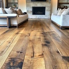 a living room filled with furniture and a fire place