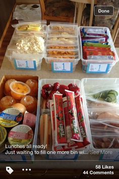 some food is sitting in plastic containers on a table with the words lunches all ready just waiting to fill one more bin see more