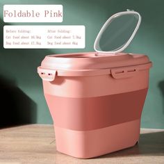 a pink cooler sitting on top of a wooden table