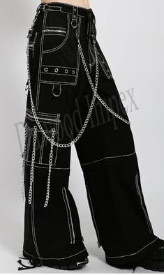 "Men's Gothic Threads Pant Black Punk Buckle Zips Chain Strap Punk Trousers with understated Gothic Pants  Men's Black heavyweight Regular pants, these black on silver Reflective pants zip off into shorts and feature removable chains, adjustable ankles, d-rings, grommets, and deep, netted pockets., Zips buckle straps detail Eyelet studded back pockets, Detachable chain straps, Size XS Trouser -Waist: 30\" Full length: 43'' Size S Trouser - Waist: 32\" Full length: 43'' Size M Trouser - Waist: 34\" Full length: 44'' Size L Trouser - Waist: 36\" Full length: 44'' Size XL Trouser - Waist: 38\" Full length: 44'' Size 2XL Trouser Waist:40\" Full length: 45\" Size 3XL Trouser-Waist:42\", Full length: 45\" Size 4XL Trouser-Waist:44\", Full length- 45\" Size 5XL Trouser-Waist:46\", Full length- 45 Tripp Shorts, Metal Pants, Punk Trousers, Reflective Pants, Chain Pants, Tripp Pants, Gothic Pants, Chain Gang, Black Punks