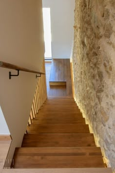 the stairs are made of wood and stone