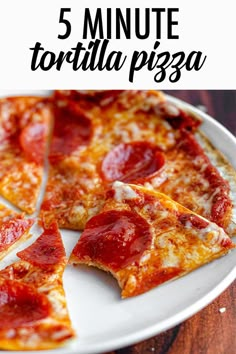 a white plate topped with slices of pizza on top of a wooden table and text overlay that reads 5 minute tortilla pizza