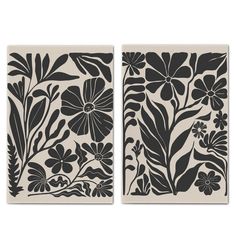 two black and white wall hangings with flowers