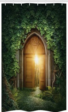 an open door in the middle of a lush green forest with sunlight coming through it