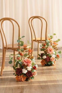 three wooden chairs with flowers on them