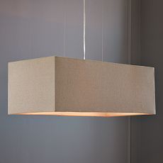 a light fixture hanging from the ceiling in a room with gray walls and flooring