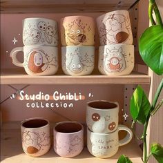 coffee mugs are sitting on a shelf