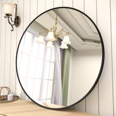 PRICES MAY VARY. Decorative Mirror: 28 inches diameter large round mirror can visually make your home more spacious and more inviting while can serving as functional wall art, Add a glamorous view to your walls, completing your modern, rustic, or farmhouse room decor Modern Brushed Frame Design: 28-inch black circle mirror is crafted of an aluminum alloy metal sleek frame, making it ideal for bathroom mirror, entrance mirror, vanity mirror, living room mirror Crystal Clear Reflection: The HD cir Circle Mirror Wall, Gold Circle Mirror, Vanity Living Room, Mirror For Entryway, Entrance Mirror, Black Round Mirror, Frame Circle, Large Round Mirror, Black Wall Mirror