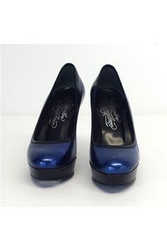 Size 6.5 EU 36.5 Midnight Blue Platform Heels Retails for $525 Made in Italy Comes with duster bag Leather soles Some wear on outer soles Leather lining Slitght wear on leather lining Very light wear on leather upper Padded insole Small mark on heel Platform height 1.25" Heel height 4.25" Fitted Blue Heels With Round Toe, Blue Heels For Work, Fitted Blue Round Toe Heels, Blue Patent Leather Heels For Work, Blue Heels With Padded Heel For Night Out, Blue Leather Heels For Night Out, Blue Platform Heels For Night Out, Blue Patent Leather Heels With Reinforced Heel, Blue Leather Round Toe Heels