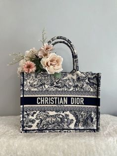 Christian Dior Medium Booktote Toile de Jouy Embroidery Navy white Flowers In Bag, Des Dior, Affordable Designer Handbags, Designer Things, Model Reference, Wallpaper Collage, Book Tote Bag, Popular Handbags, Dior Book Tote