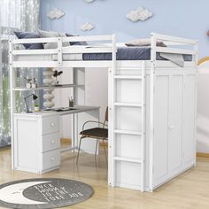 a white loft bed with desk underneath it