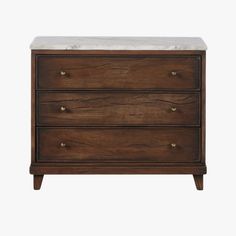 a wooden dresser with marble top and two drawers on one side, against a white background