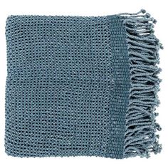 a blue knitted blanket with fringes on top and one piece of yarn in the middle