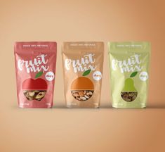 three bags of fruit mix on a brown background