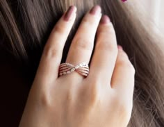 a close up of a person wearing a ring