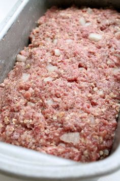 ground meat in a baking pan ready to go into the oven