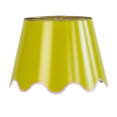 a yellow lamp shade with scalloped edges on an isolated white background for lighting