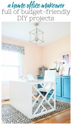 a white table sitting on top of a hard wood floor next to a blue cabinet