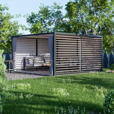 a small house in the middle of some grass