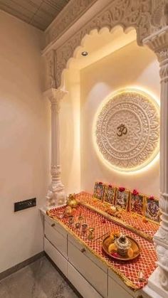 a white room with an intricately decorated table