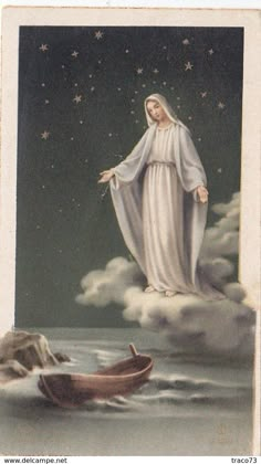 an image of the virgin mary in the sky with stars above her and a boat on the water