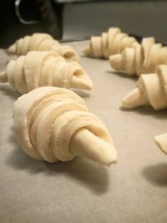 peeled bananas on a baking sheet ready to be baked