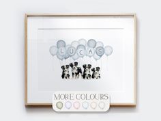 a framed photo with balloons and dogs on it, in front of the words lucas more colours